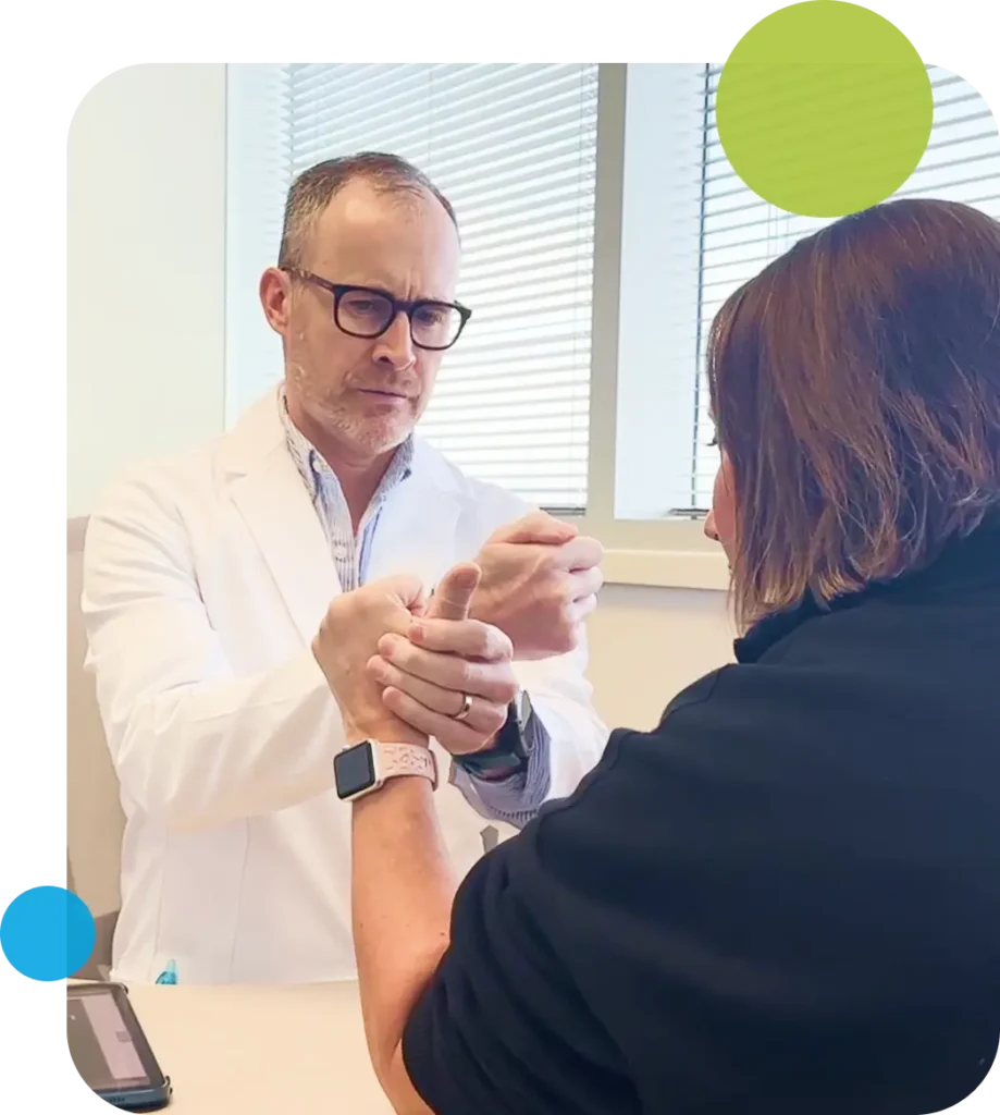 Physician holding patients wrist