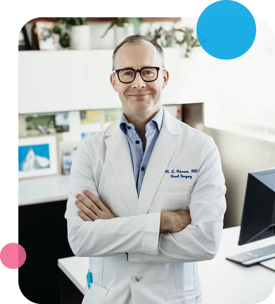 Dr. Nicoson Headshot with spheres